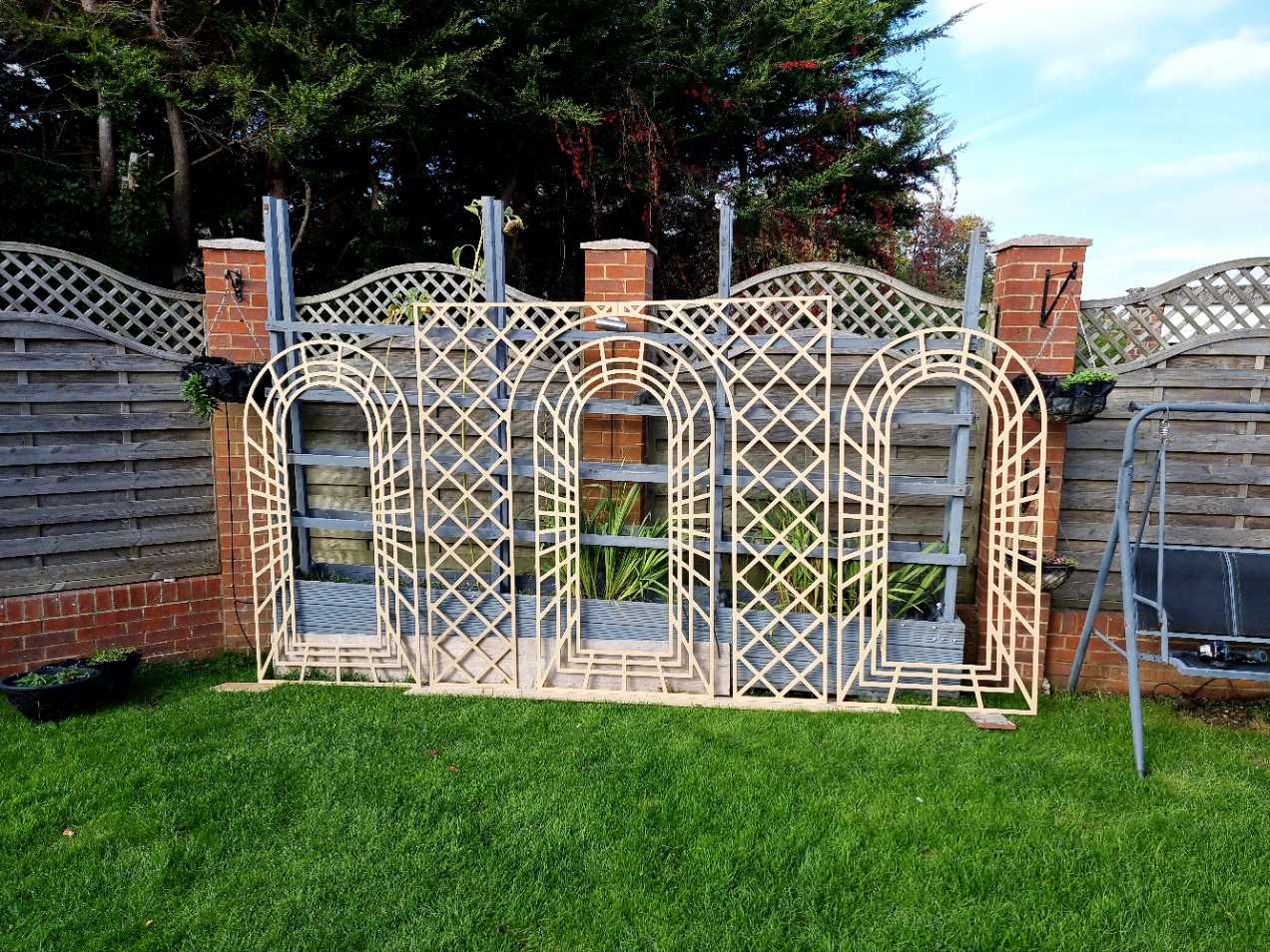 Large CNC-cut exterior trellis panels