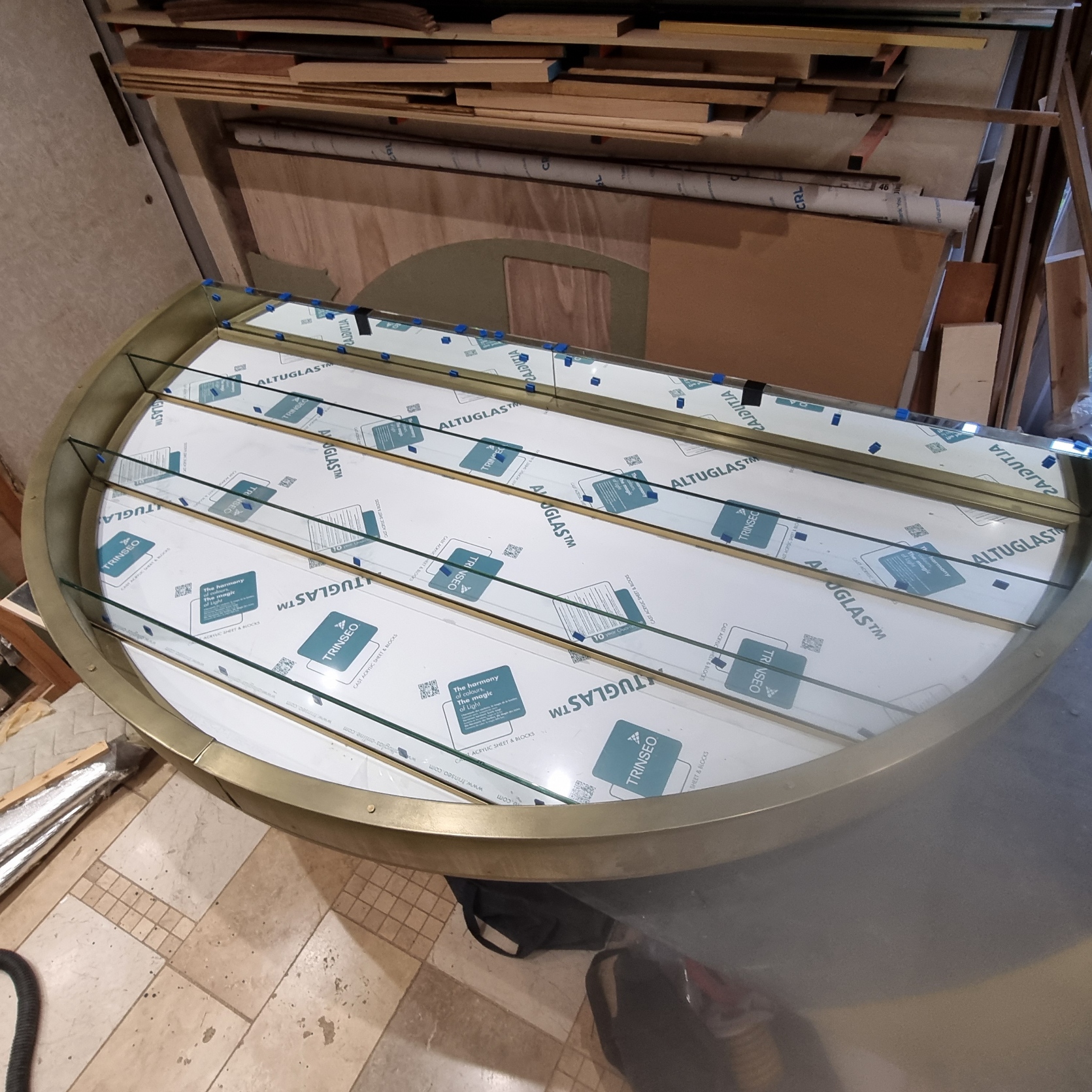 Semicircular champagne display fully dry fitted in the Kustom Made workshop