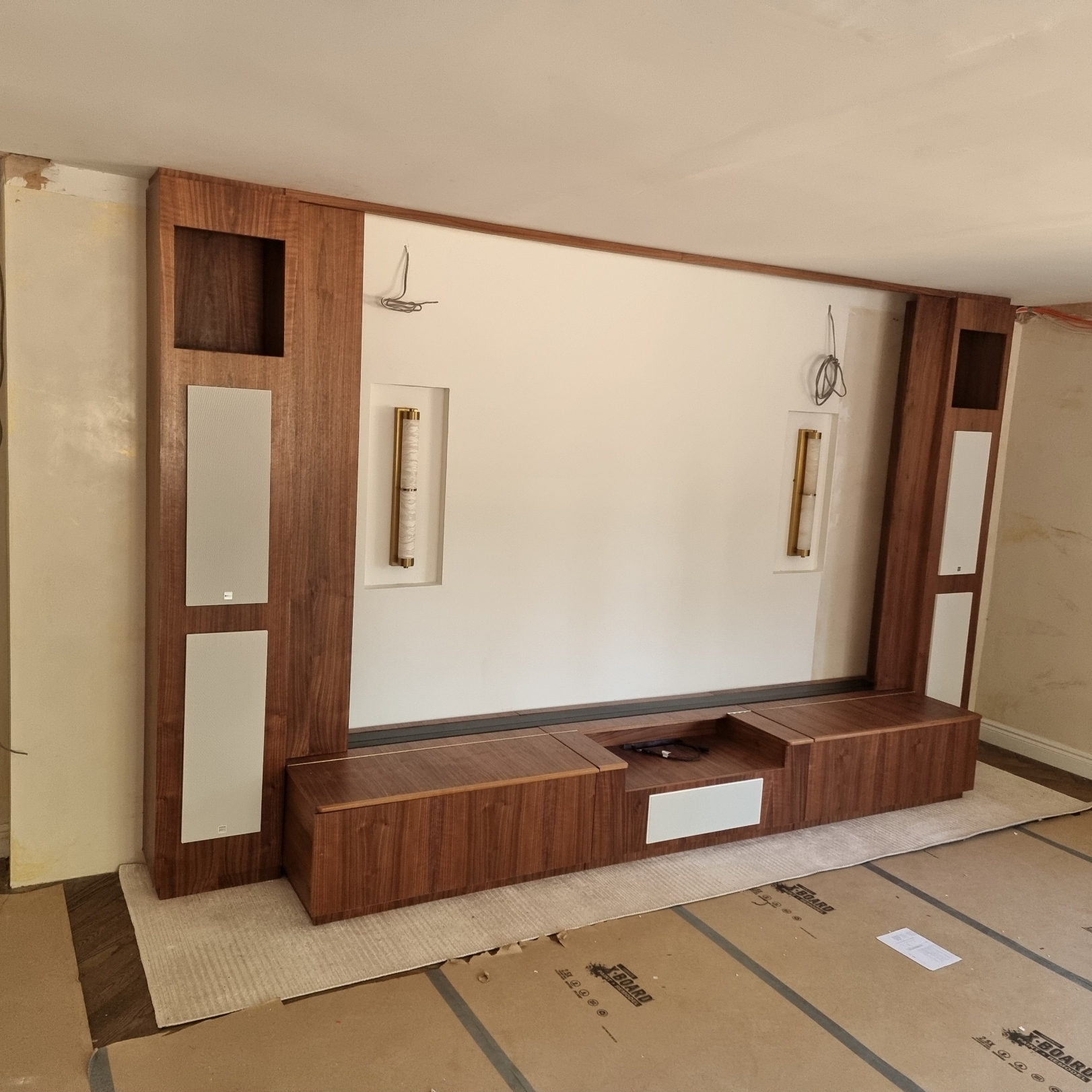 Installed bespoke cinema cabinet designed around the specified AV equipment