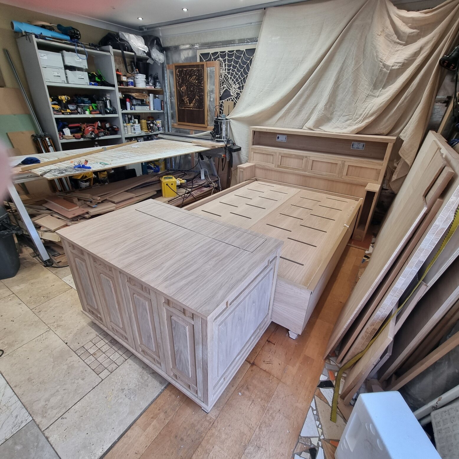 Signature bed and television blanket box assembled together in the workshop