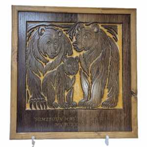 Front view of Three Bears wall art carved from reclaimed wood with golden resin background.