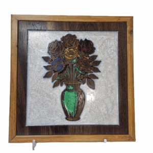 vibrant roses wood carving in a green vase with white resin background