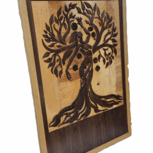 Left angle photo of the Chakra Tree wall art showing carved details and contrasting reclaimed wood.