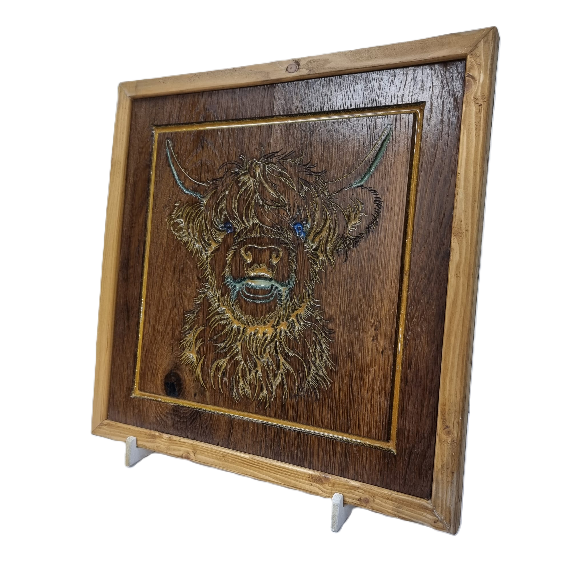 Right-angled view of rustic Highland cow wall art with resin inlay and wooden frame