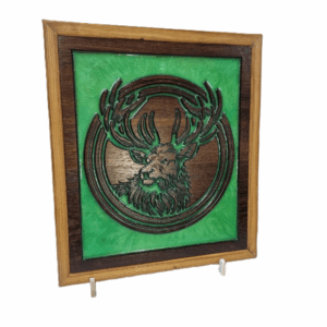Right-angled view of the CNC-carved peacock artwork with colourful resin inlays.