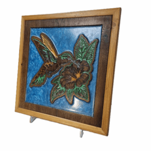 Right angle view of handcrafted hummingbird artwork with resin inlay.