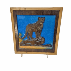 Leopard on the Prowl resin artwork with carved wood details and oak-stained frame, photographed in full.