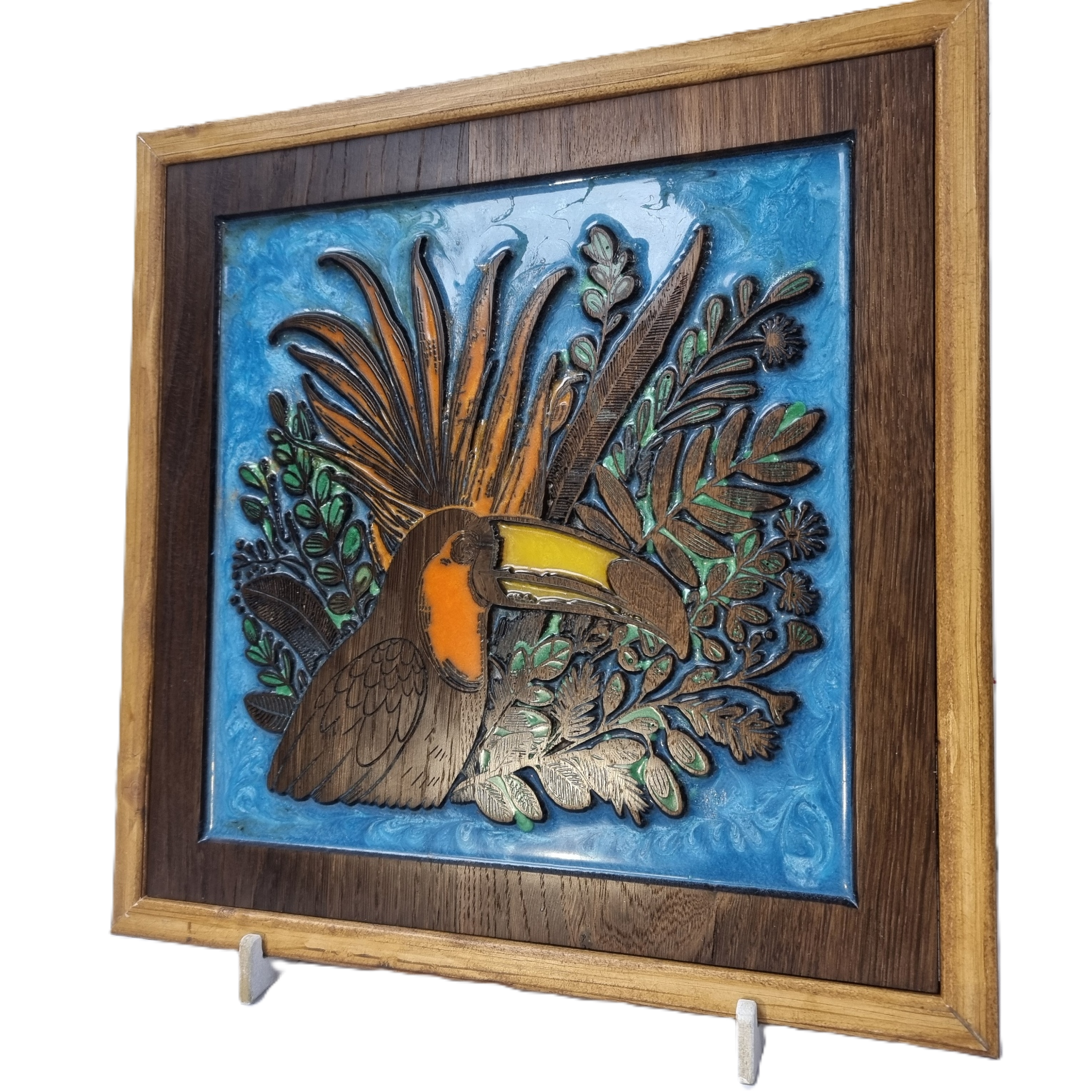 Handcrafted tropical toucan wall art in reclaimed Corinthia oak with vibrant resin colours – angled left view