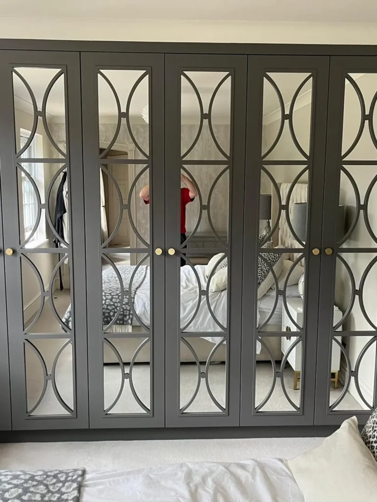 bespoke fretwork wardrobe doors mirrored fitted joinery bedroom
